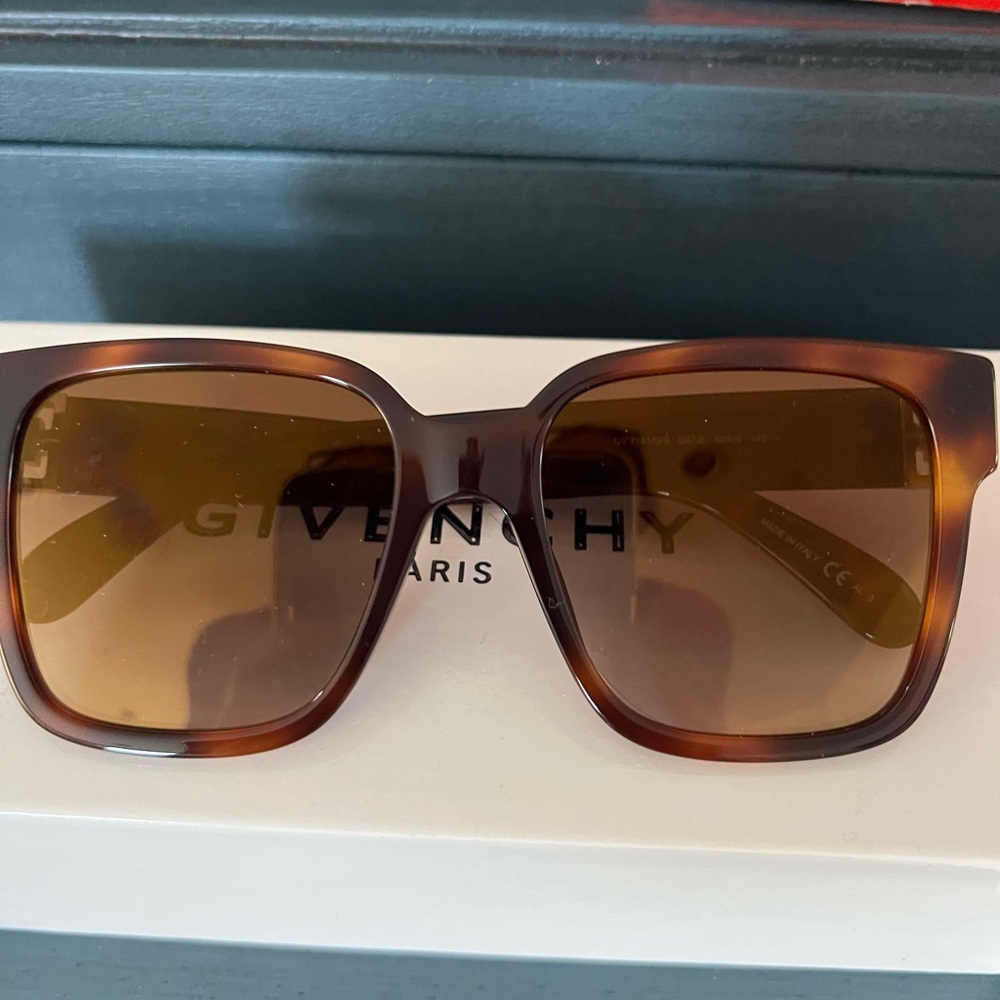 Brand new, never worn tortoise shell givenchy sunglasses.